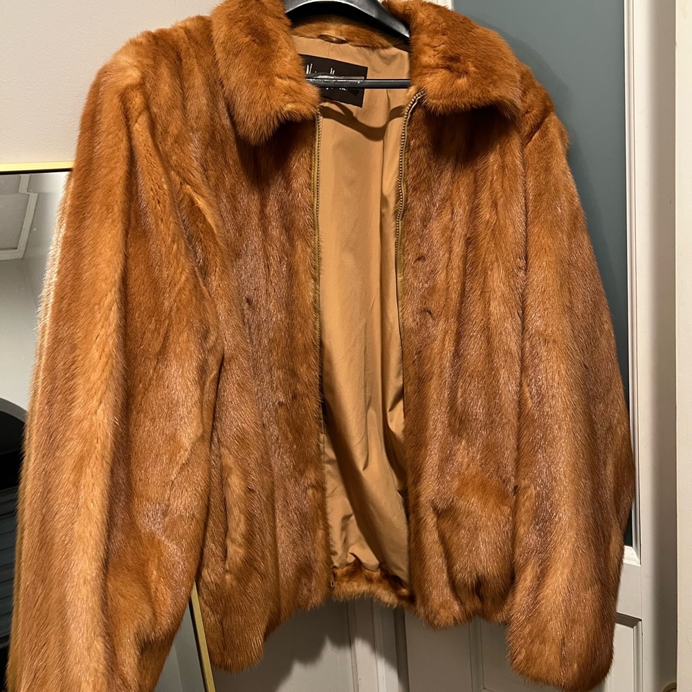 Mens 100% full skin whiskey colored mink coat from Neiman Marcus.